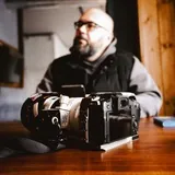 Человек с фотоаппаратом