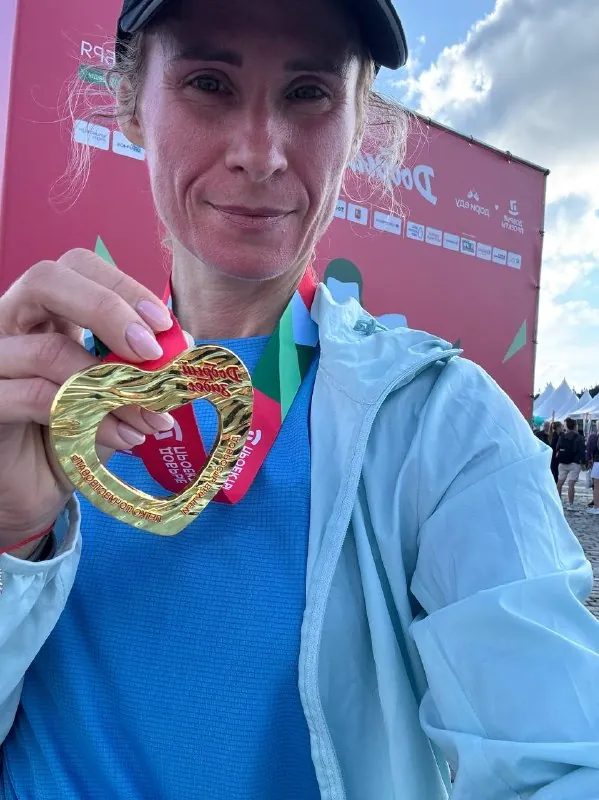 Я финишировала, пробежав 10 км.