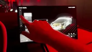 В Tesla Roadster при включении задней передачи появляется ежик, который протирает камеру заднего вида.